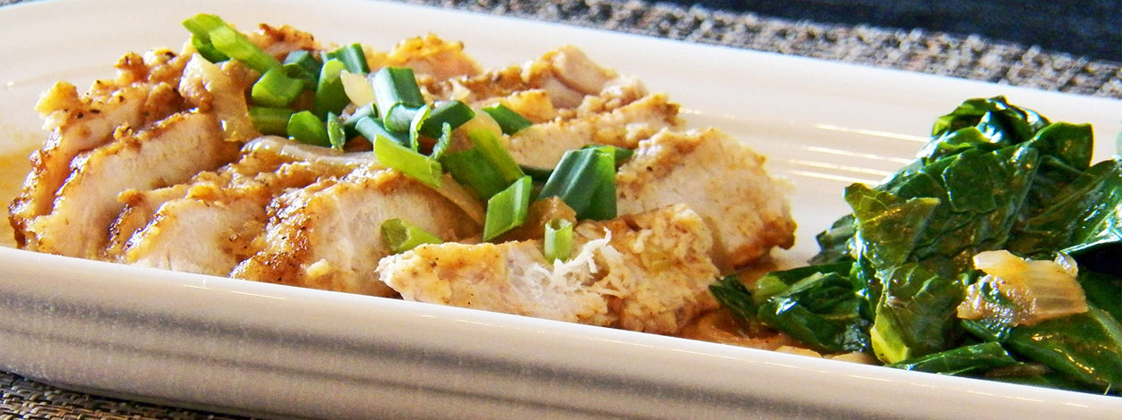 Smothered pork chops and greens wide enlarged