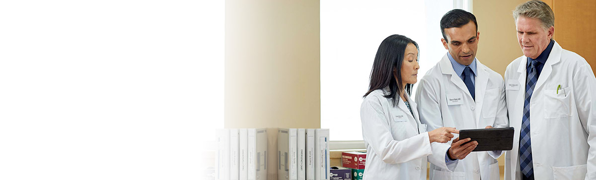 three medical professionals